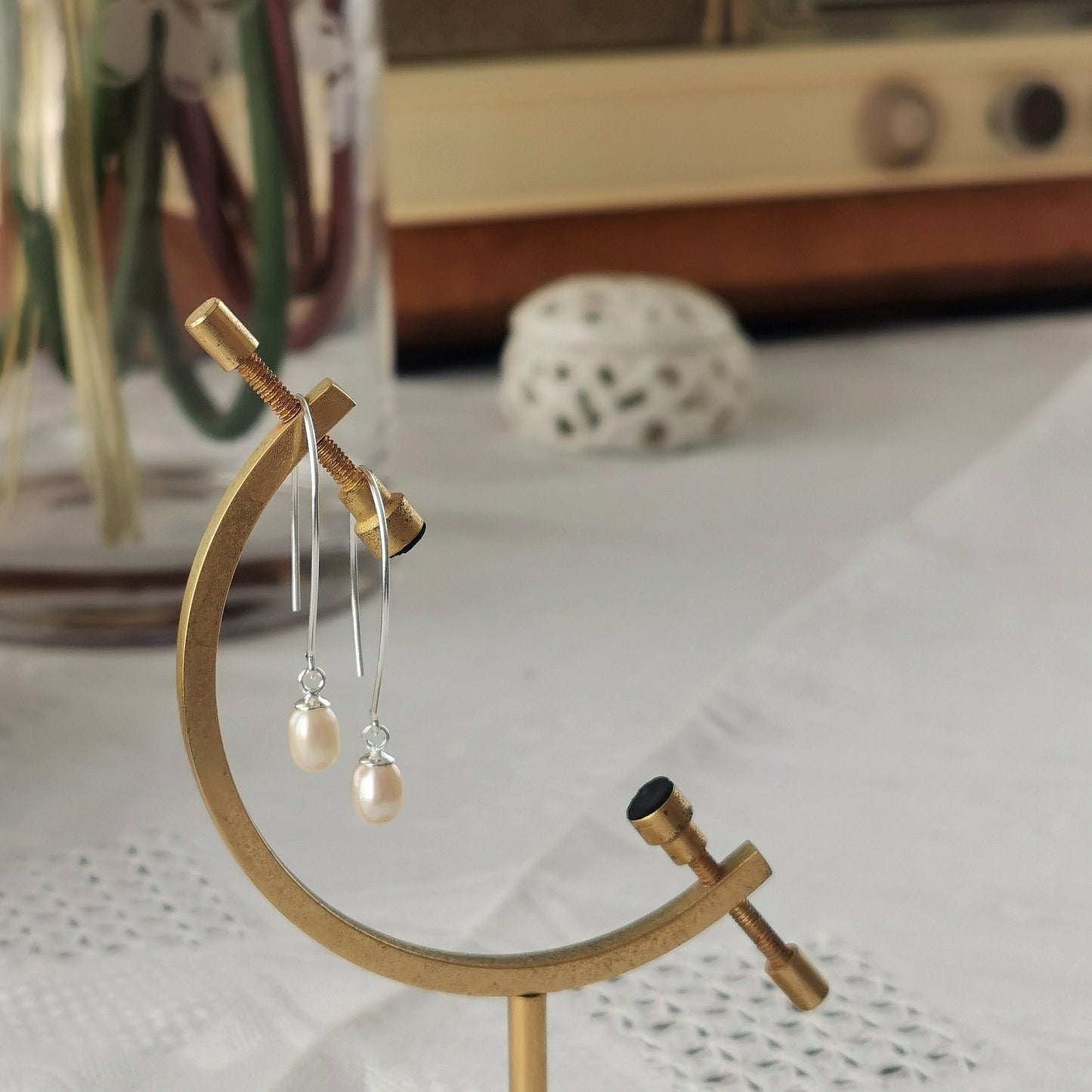 Earrings with small teardrop pearl