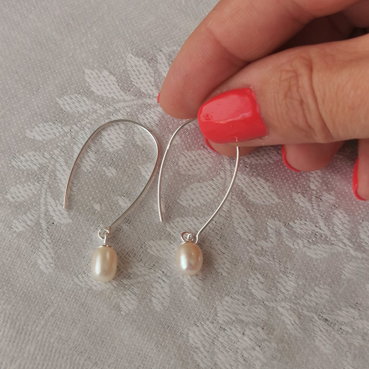 Earrings with small teardrop pearl